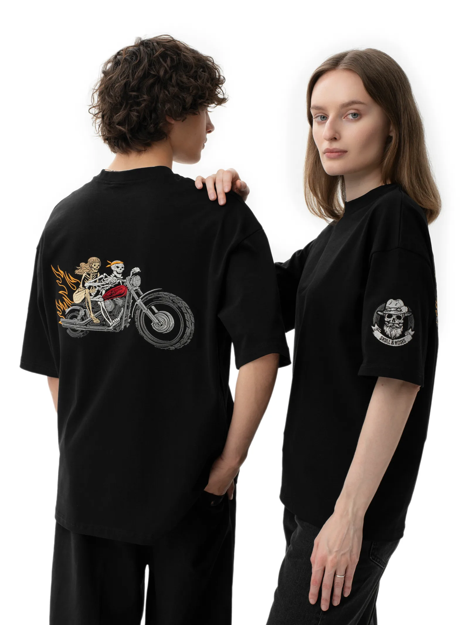Two models wearing the Skull & Roses motorcycle graphic T-shirt