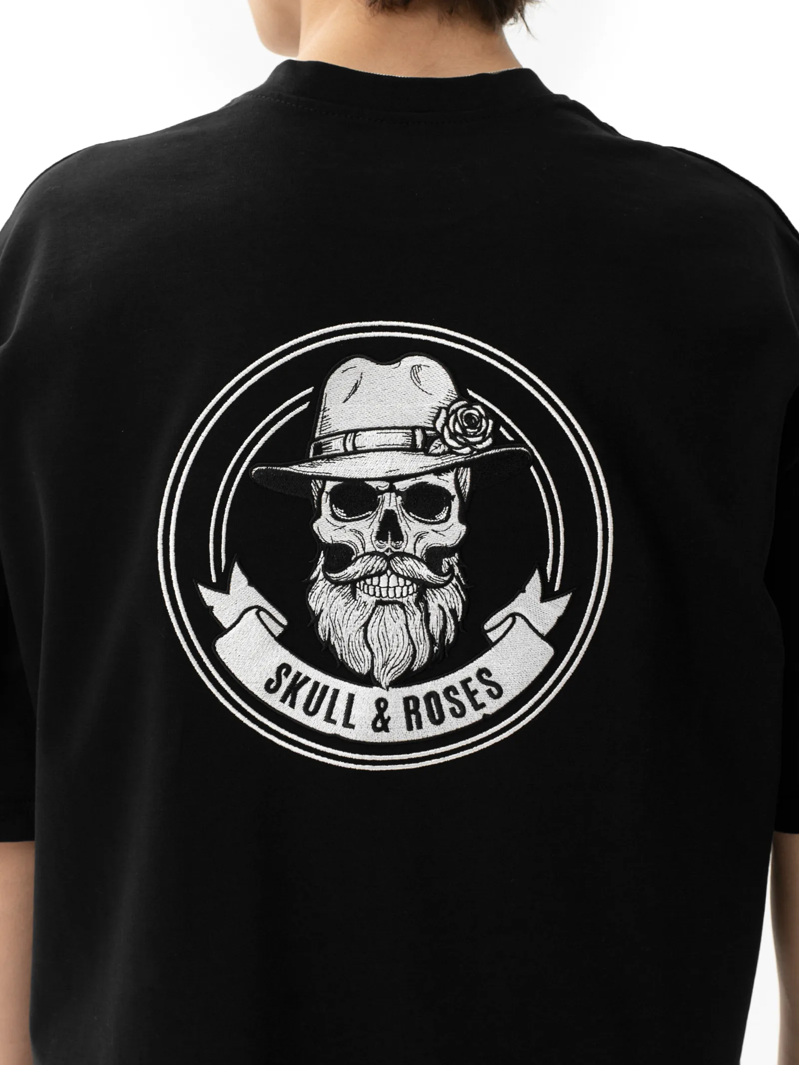 Brotherhood logo embroidery on the back of a Skull & Roses T-shirt